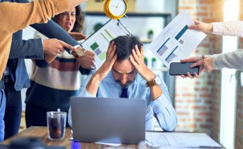 Group,Of,Business,Workers,Working,Together.,Partners,Stressing,One,Of
